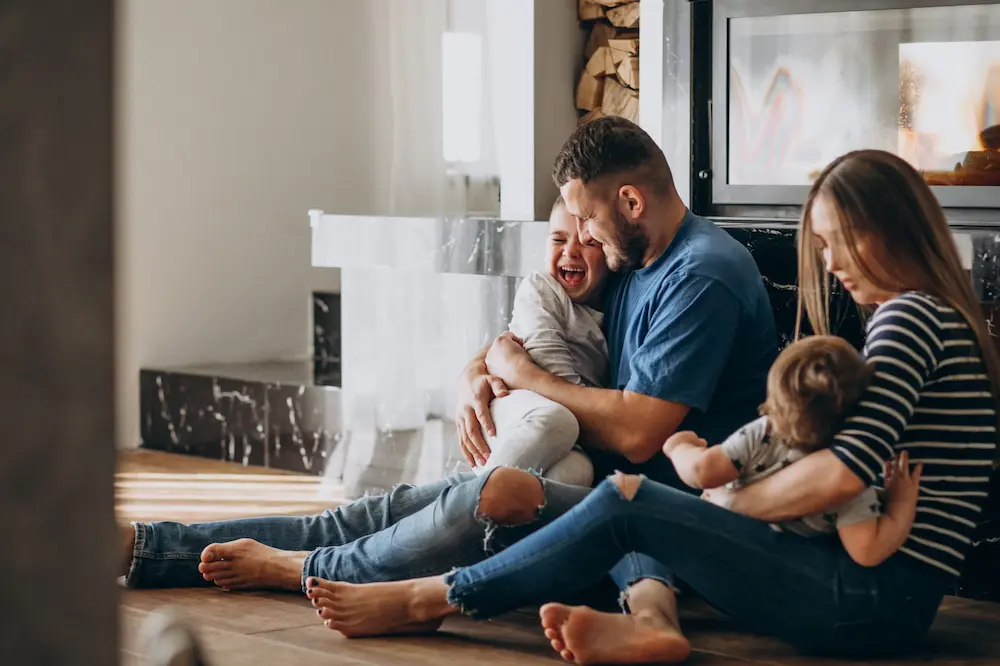 Happy family sitting together
